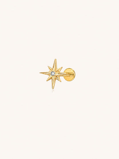 Gold G23 titanium starburst flat back stud with clear zirconia for helix lobe and cartilage piercings