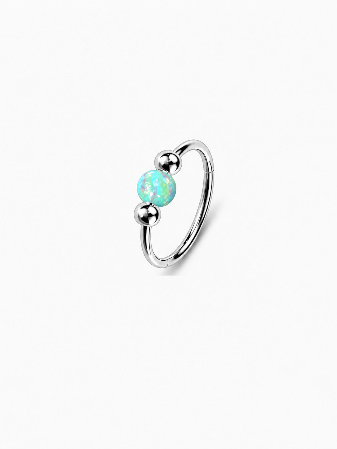 Silver G23 titanium seamless clicker ring featuring a glowing green opal center bead