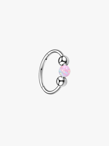 Silver G23 titanium seamless clicker hoop featuring a soft pink opal bead for ear piercings