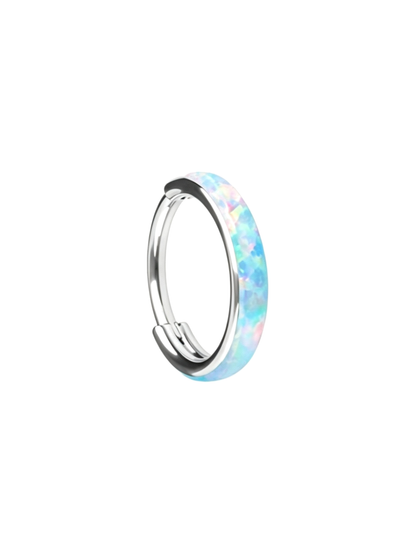 Iridescent white opal G23 titanium clicker hoop with soft blue and pink reflections.