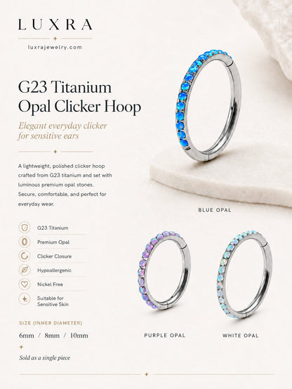 G23 titanium opal clicker rings in blue purple and white opal with available sizes