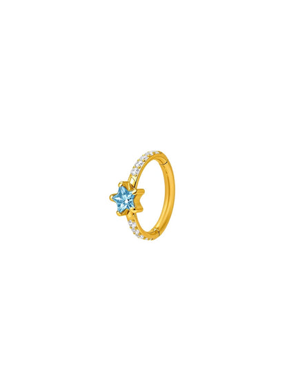Gold G23 titanium star CZ clicker hoop with blue star center and clear pavé stones.