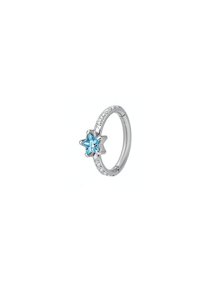 Silver G23 titanium star CZ hinged clicker hoop with blue star center and clear pavé accents.