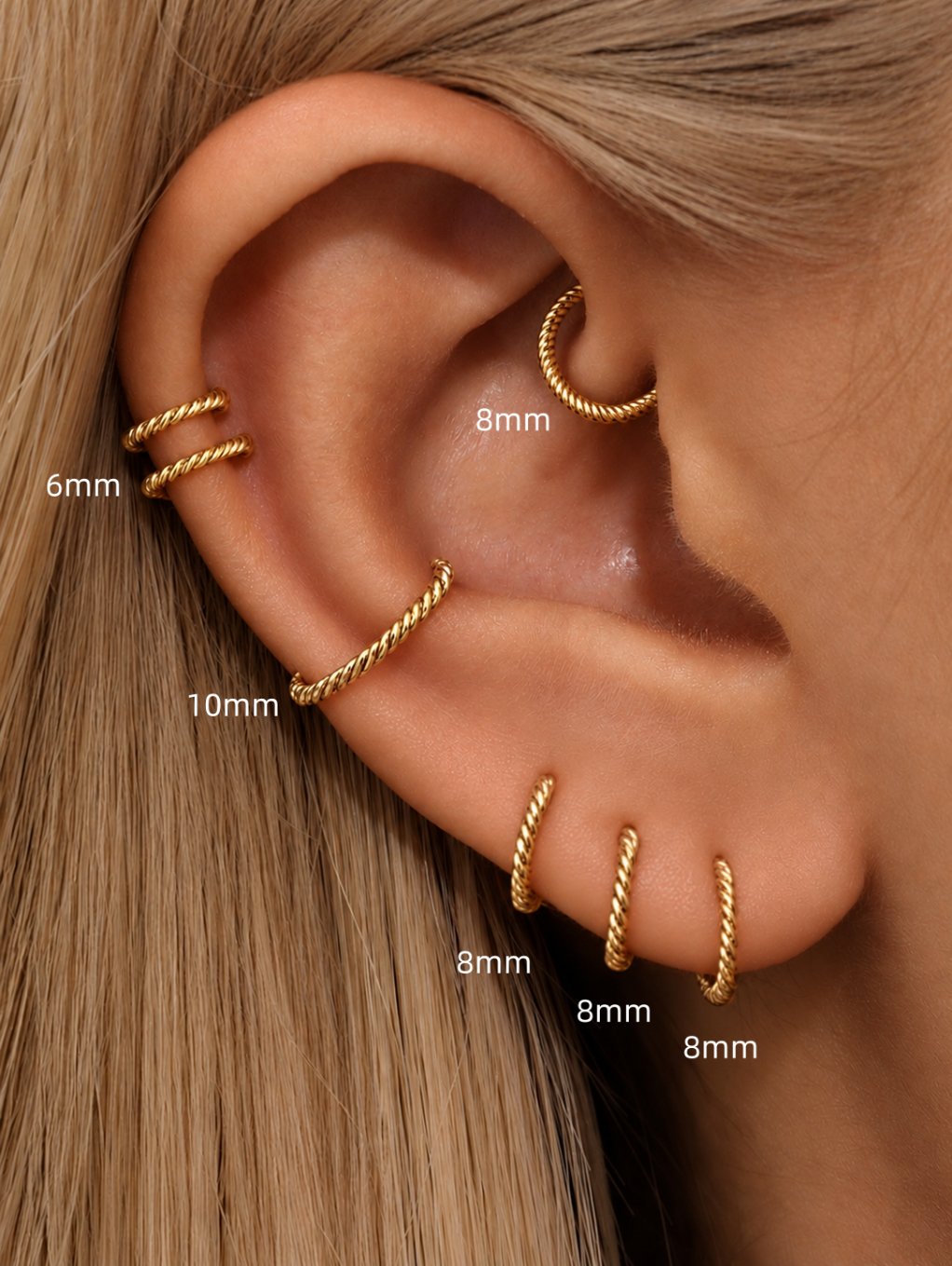 G23 titanium twisted hoop ear placement guide showing 6mm, 8mm and 10mm sizes on different piercings