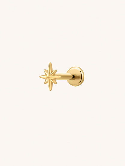 Gold eight point star threadless flat back stud in G23 titanium for cartilage piercings