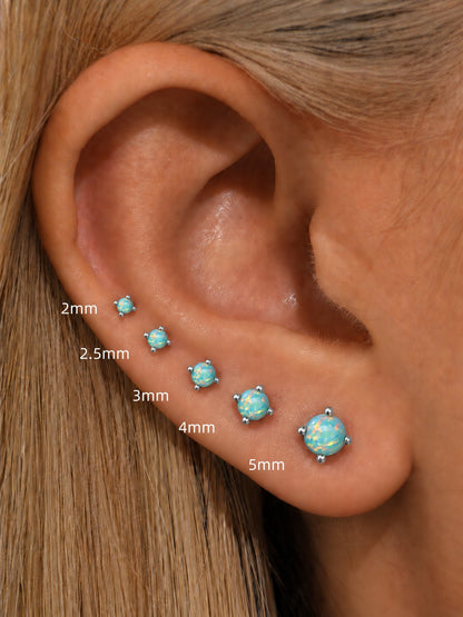Green opal flat back stud size comparison from 2mm to 5mm shown on ear