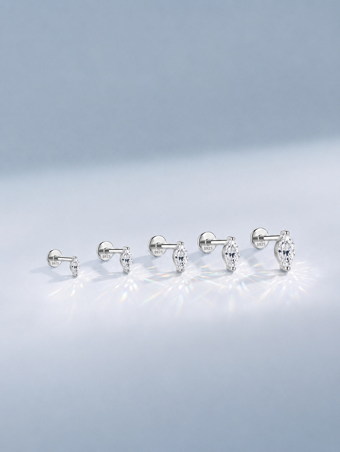 Marquise-cut moissanite sterling silver flat back studs in five graduated sizes