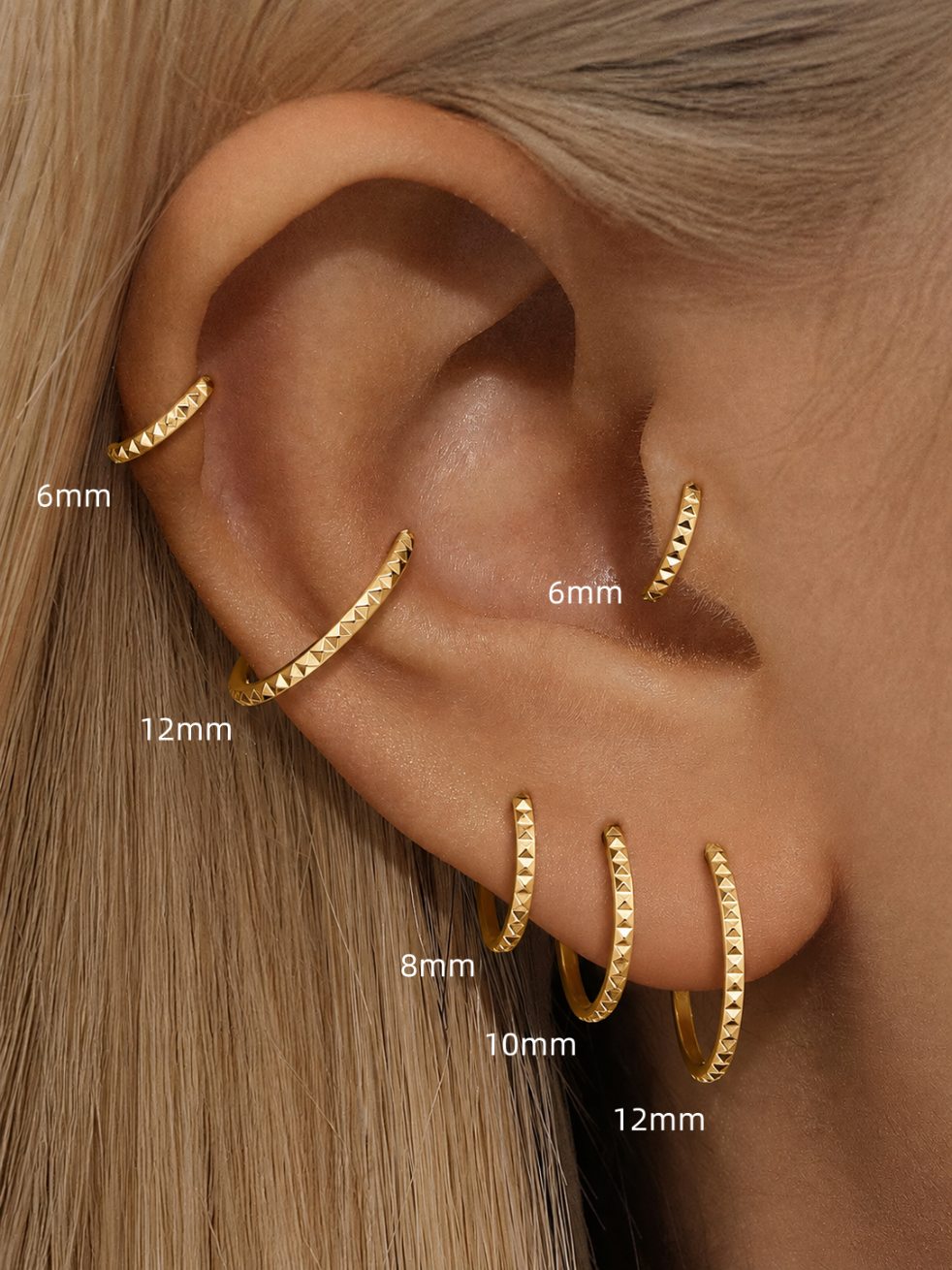 Titanium clicker ring size guide showing 6mm 8mm 10mm and 12mm on the ear