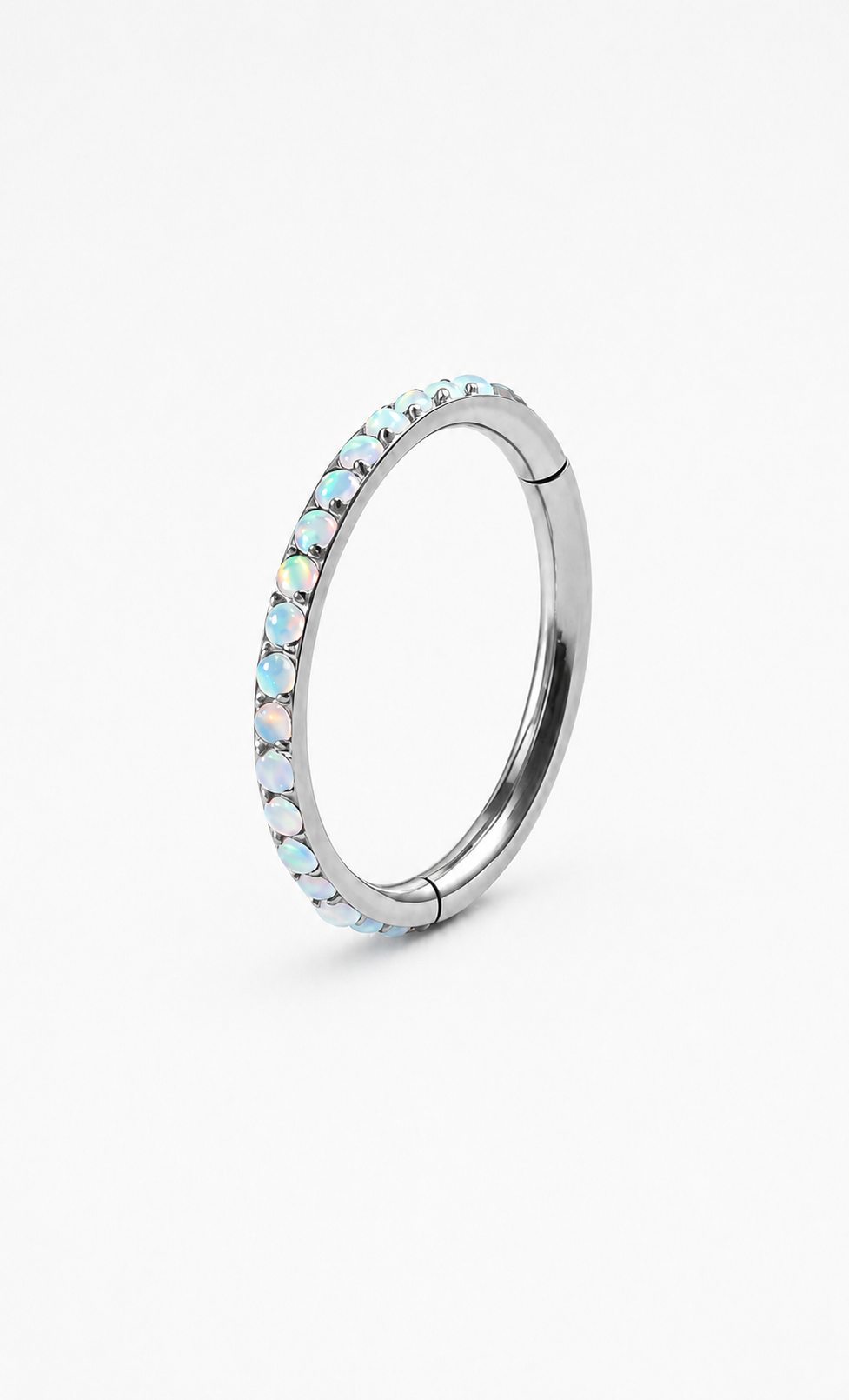 Blue opal G23 titanium hinged clicker ring on a white background